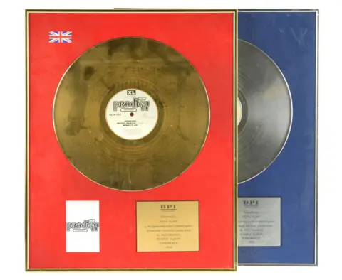 Cheffins/PA Media Keith Flint's gold discs