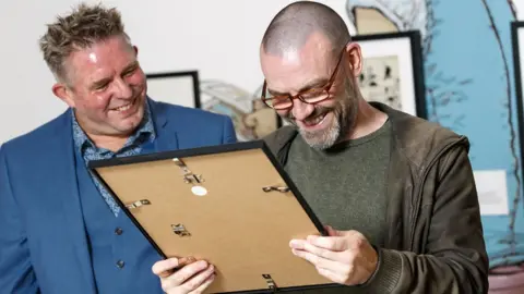 SNS Group Roddy Scott Frank reading the strip for the first time