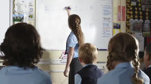 Getty Images Children in a classroom.