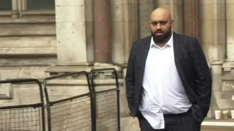 Atwal leaving the Royal Courts of Justice