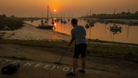 Adam Bennett Adam Bennett photographing sunrise in South Woodham Ferrers
