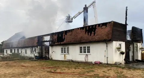 Essex County Fire and Rescue Firefighters tackling the blaze at Ardleigh