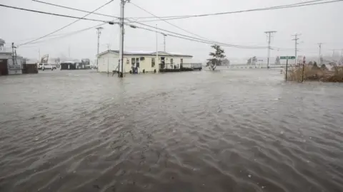 Getty Images An flooded home in coastal Massachusetts