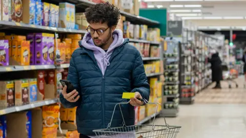 Getty Images Man doing food shop