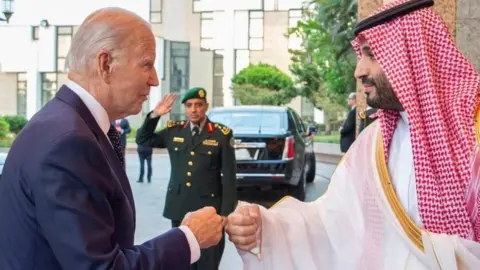 Reuters US President Joe Biden (left) fist-bumps Saudi Crown Prince Mohammed bin Salman (right) in Jeddah, Saudi Arabia/. Photo: 15 July 2022