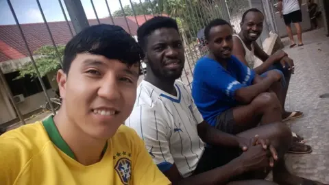 Shams Erfan Shams with friends at the Batam community accommodation