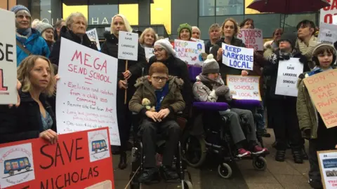 BBC Parents and campaigners outside cabinet meeting