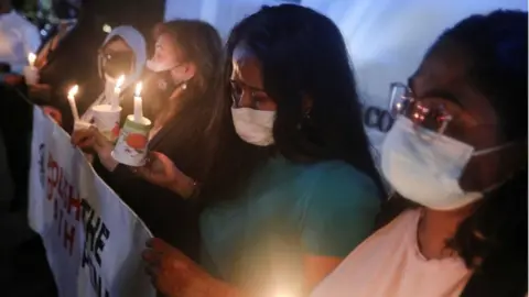 Reuters Angelia Pranthaman, sister of Pannir Selvam Pranthaman, a Malaysian drug trafficker facing death sentence, cries at a vigil for Nagaenthran Dharmalingam