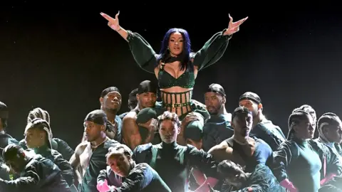 Kevin Winter Cardi B performing live