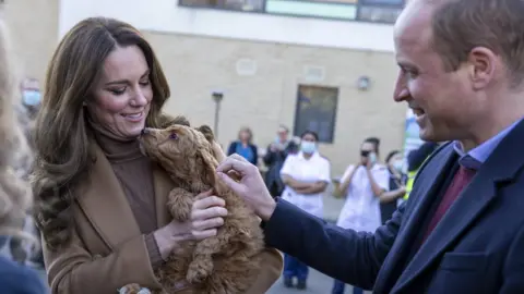 PA Media The Duke and Duchess of Cambridge meet new 'therapy puppy' Alfie