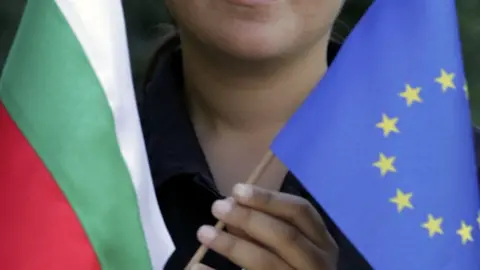 Getty Images File image of woman holding a Bulgarian flag and an EU flag