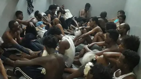 via Giulia Tranchina Migrants being held in a detention centre in Zintan, Libya