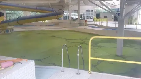 Barry Harding Keswick pool covered in algae
