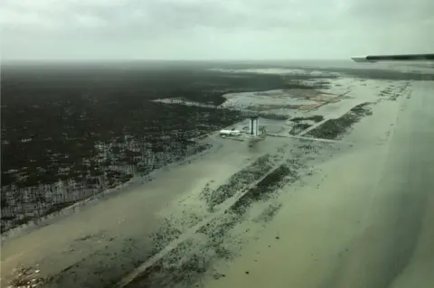 Michelle Cove/Trans Island Airways/via Reuters Devastation on the Abaco Islands, Marsh Harbour airport