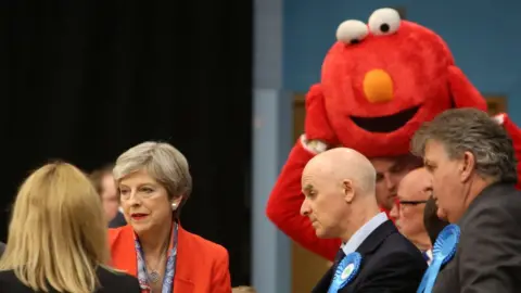 Getty Images Bobby Smith at the election count with Theresa May in the foreground