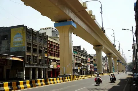 Getty Images Closed shops and deserted streets are photographed in Nagpur city of Maharashtra, on March 29, 2021, amid the Covid-19 pandemic.