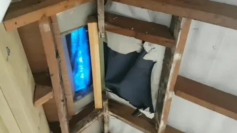 Claire Snook Unfinished and leaking roof