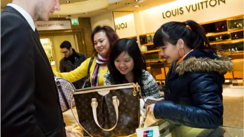 Getty Images Shoppers at Harrods