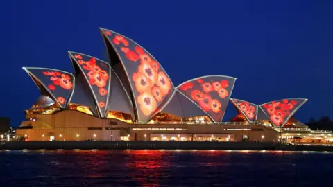 Reuters Red poppies are projected on to the sails of the Sydney Opera House