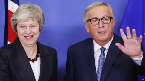 EPA Theresa May and Jean-Claude Juncker