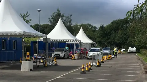 BBC Traffic queuing at a testing centre in Tredomen