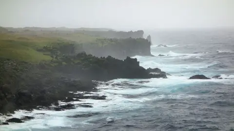 Dominic Hodgson/BAS The wind and waves create a salty spray that disperses over the coast