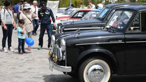 Getty Images A 1959 Datsun 1000 sedan on display in Tokyo.