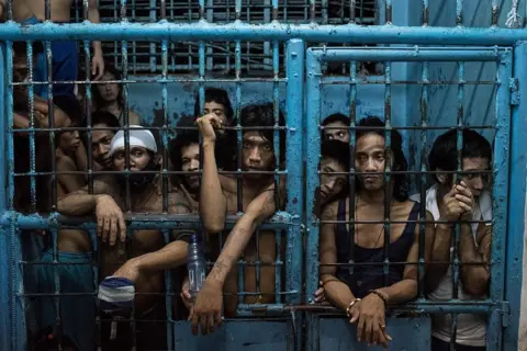 Getty Images A police cell crowded with prisoners