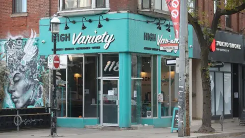 Toronto Star via Getty Images Two pop shops High Variety and Tokyo Smoke sit beside each other on Queen Street East.