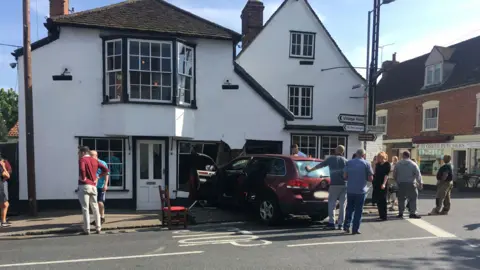 John Sneddon A car crashed into a house