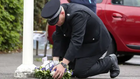 PA Media Officer laying wreath