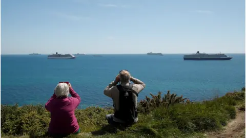 Reuters Cruise ships off the coast of Weymouth