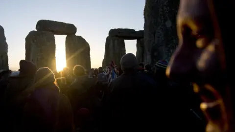 AFP Pagan revellers celebrate the winter solstice at Stonehenge in Wiltshire in southern England on 21 December 2012