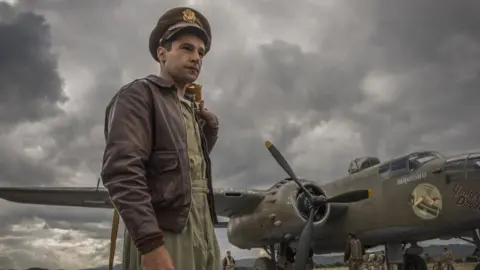 Hulu via Channel 4 Christopher Abbott plays Yossarian, who is desperate to escape his bomber squadron