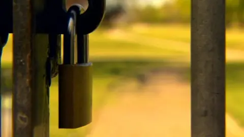 BBC Padlock on gate