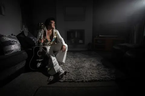 Joann Randles Elvis tribute artist Darren 'Graceland' Jones, from Pontypool, taken at his home ahead The Porthcawl Elvis Festival