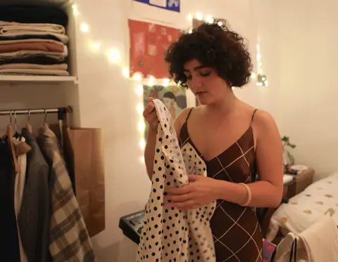 Sophie Wedgwood/BBC Gilda Bruno gets ready for an evening out