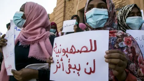 Getty Images A protest in Khartoum against normalising relations with Israel - October 2020