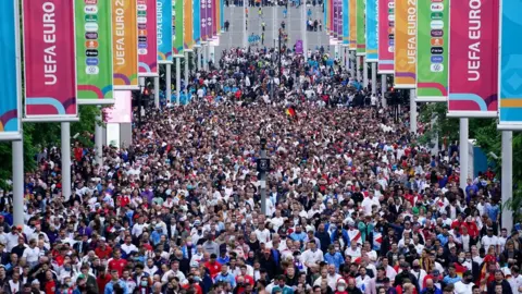 PA Media Fans leaving Wembley Stadium after the England v Germany game in Euro 2020