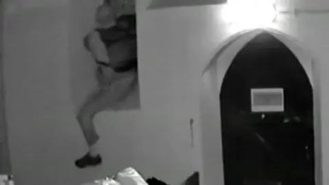 A man breaking into a church