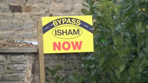 Isham bypass sign