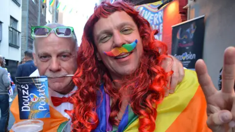 Eurovision fans Joe (left) and John from Cork, Ireland, outside the Masquerade bar in Liverpool before the Eurovision final