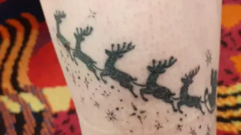 Clare Byrne Christmas tattoo