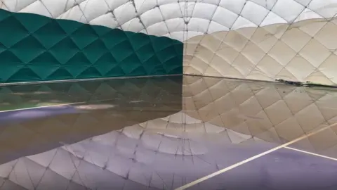 Flooded tennis courts