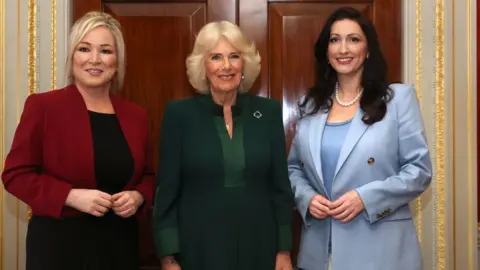 Liam McBurney/PA First Minister Michelle O'Neill and Deputy First Minister Emma Little-Pengelly meet Queen Camilla