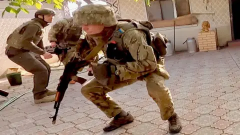 Darren Conway Troops under fire