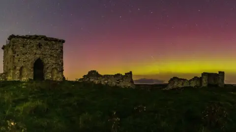 Tom Wright Rothley Castle lit up by the Aurora Borealis