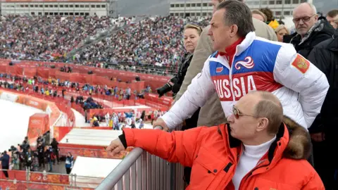 AFP President Putin watching skiing event at Sochi 2014 Paralympics, 9 Mar 14