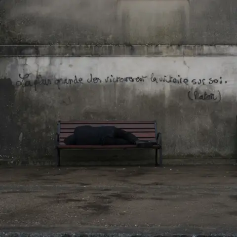 Wendy Aldiss Man sleeping on a bench