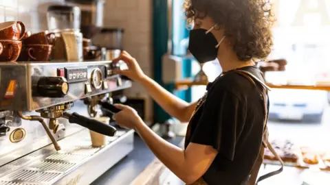 Getty Images Coffee shop worker